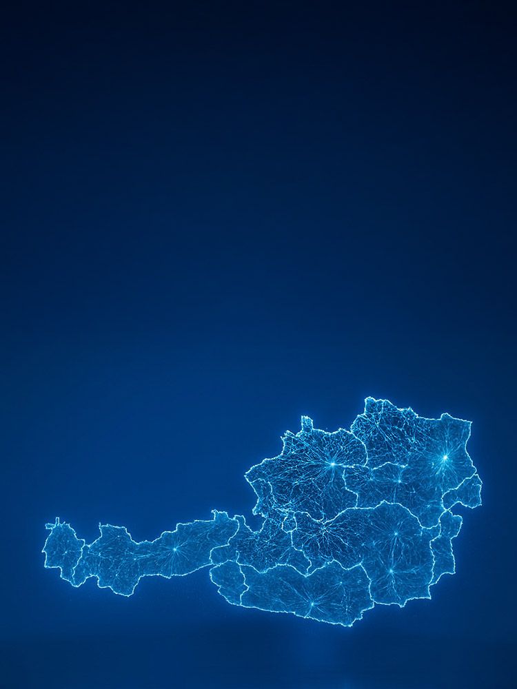 Eine türkis leuchtende Österreichkarte auf einem dunkelblauen Hintergrund